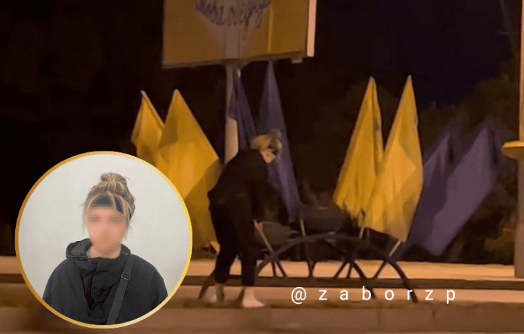 В Запорожье полиция задержала девушку, которая сорвала флаги с украинской символикой на центральном проспекте: подробности